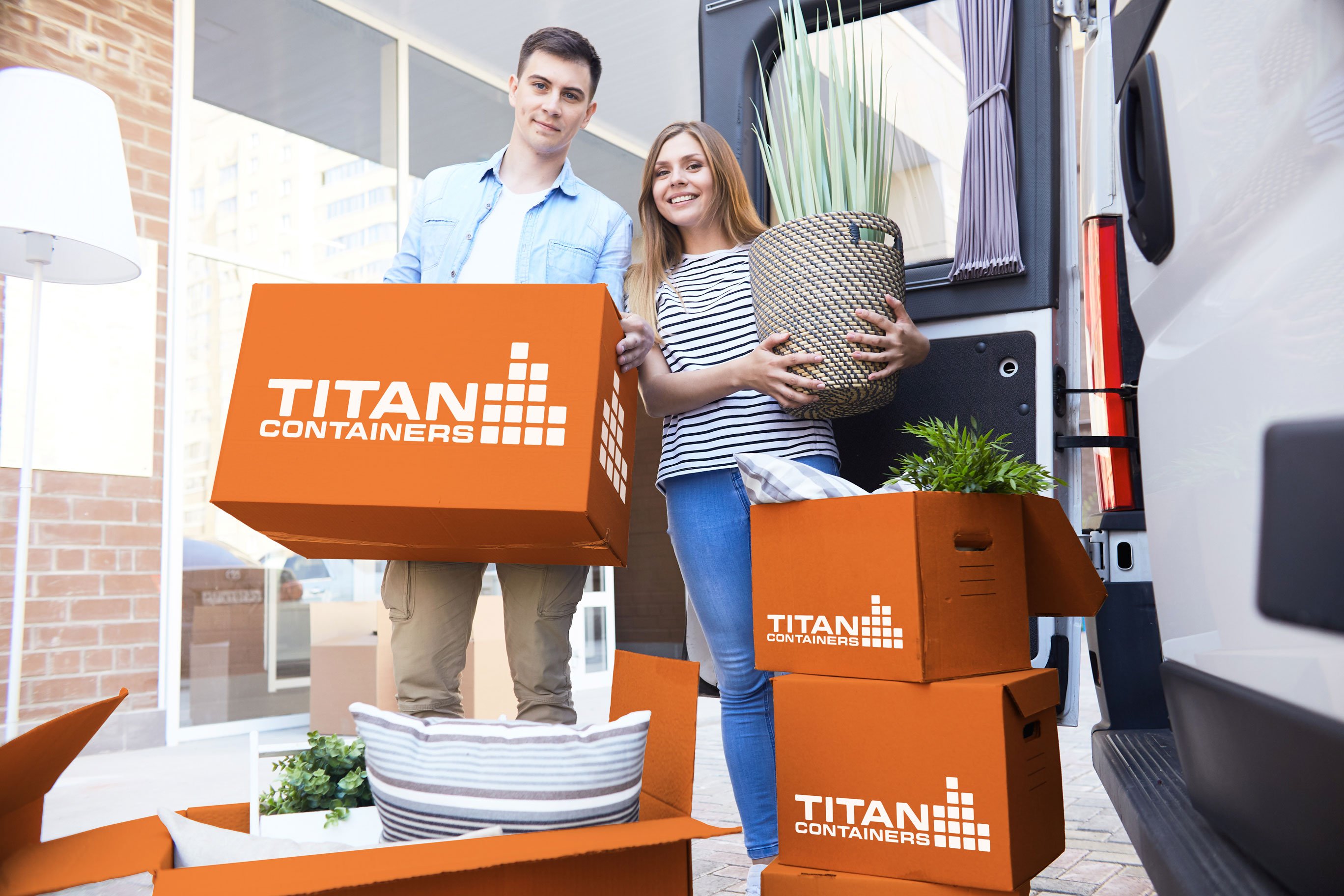 couple-with-TITAN Container Self Storage boxes